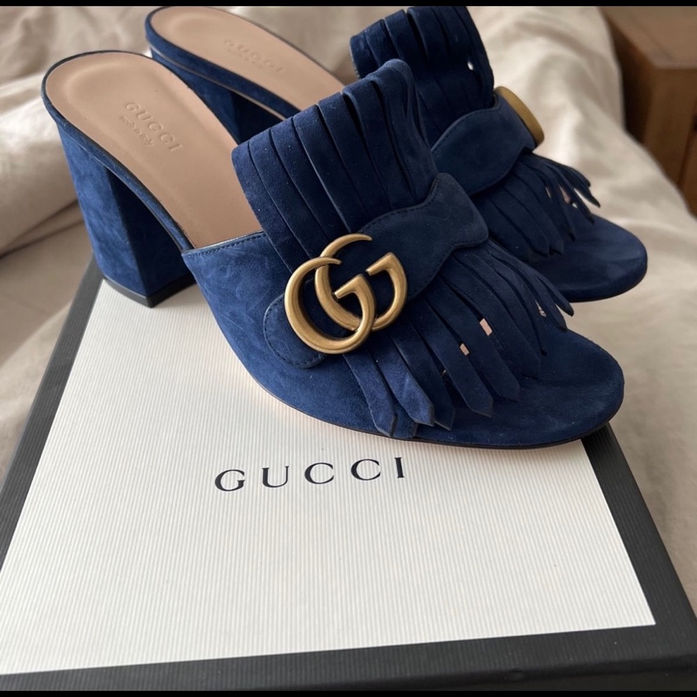 Gucci GG marmont mule. Worn around the house only. Almost brand new condition.